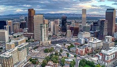 denver skyline with rocky mountains in the background 