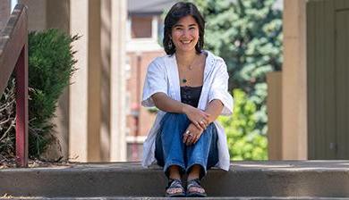 Emmy Radin sits for a photo on the DU campus.